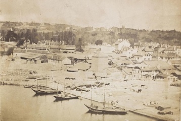 image sépia avec bateaux et habitations dans le fond